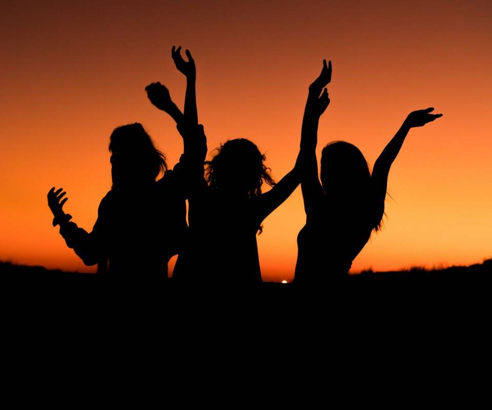 <a href="https://unsplash.com/@homeschool?utm_content=creditCopyText&utm_medium=referral&utm_source=unsplash">Levi Guzman</a> on <a href="https://unsplash.com/photos/silhouette-of-three-woman-with-hands-on-the-air-while-dancing-during-sunset-zdSoe8za6Hs?utm_content=creditCopyText&utm_medium=referral&utm_source=unsplash">Unsplash</a>